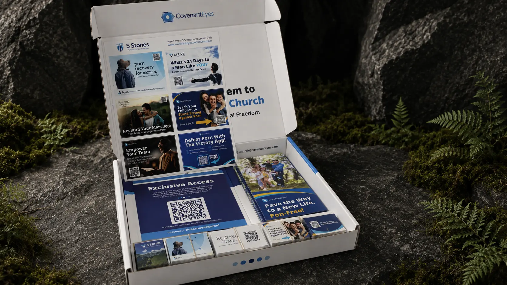 The 5 Stones kit open on dark stone, the interior lid printed &ldquo;The Weapon System to Fight Porn in Your Church&rdquo; and the tray filled with brochures and resource cards.