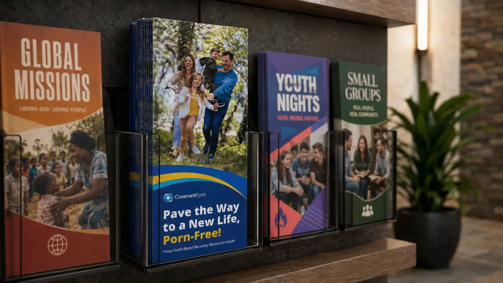 The 5 Stones brochure in a church literature rack, sitting alongside Global Missions, Youth Nights and Small Groups brochures.