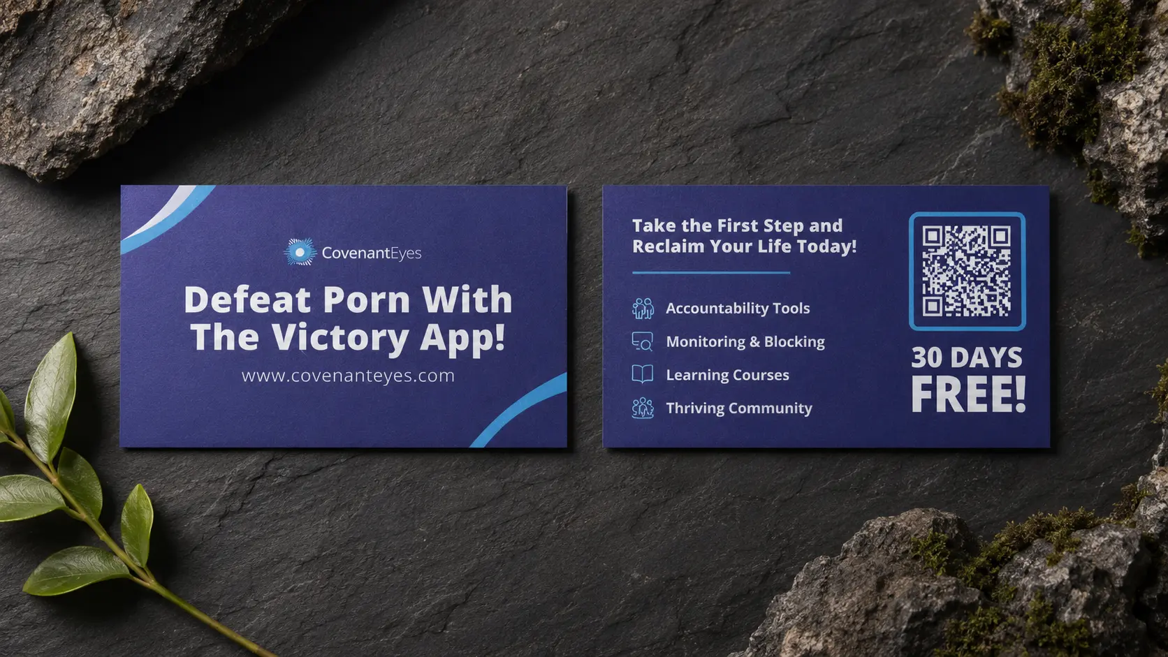 The Victory App card, front and back, on dark stone: &ldquo;Defeat Porn With The Victory App!&rdquo; and a reverse listing accountability tools, monitoring and blocking, learning courses and community, with 30 days free.